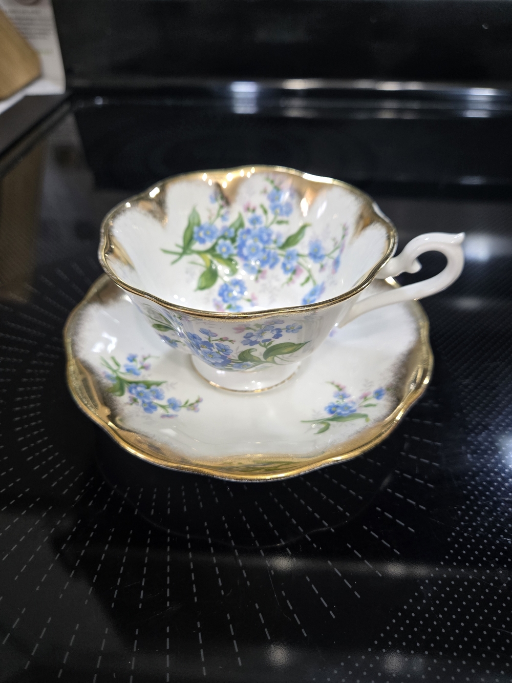 Royal Albert Blue Floral Teacup and Saucer with Gold Trim Forget Me Not